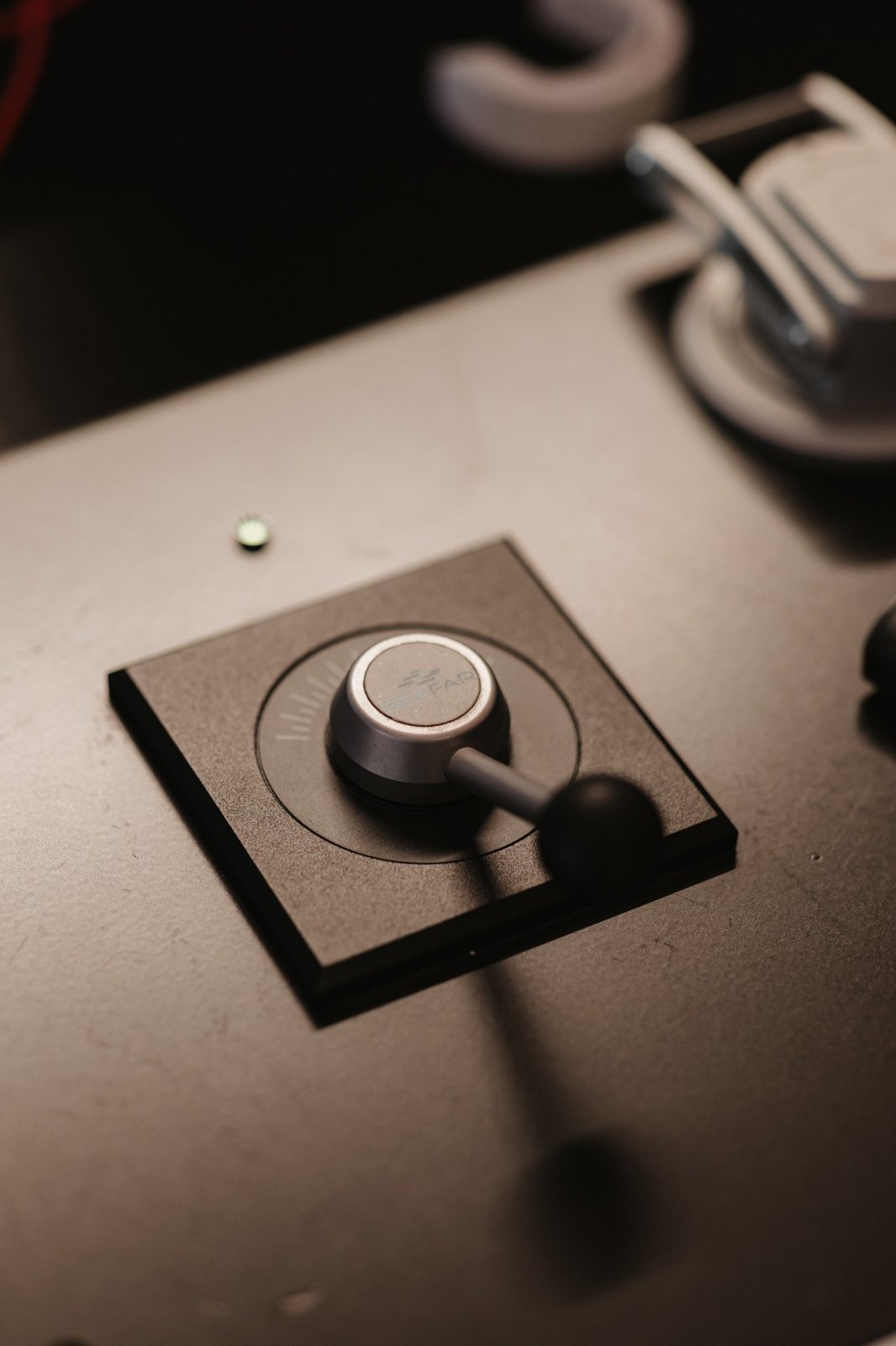 The handle and steering wheel at a Seafar operator desk